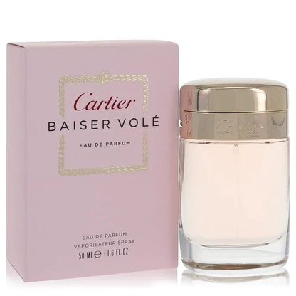 Cartier Baiser Volé Perfume bottle — Pure Floral women fragrance with lily petals, lily flower, green lily leaves, and a powdery musky base