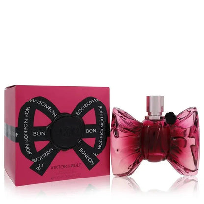 Viktor & Rolf Bonbon Perfume signature luxury wrapped bon bon bow-shaped pretty pink glass flacon displaying its premium fluid contours, precise typographical details, and sleek silver topper architecture details against a clean background
