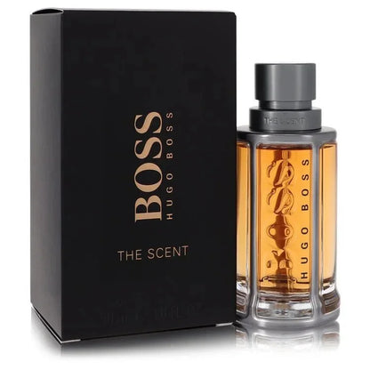Hugo Boss The Scent eau de toilette spray for men with black box and amber perfume bottle