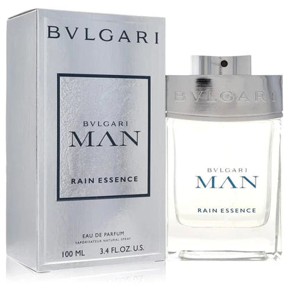 An authentic clear glass bottle of Bvlgari Man Rain Essence Cologne showcasing its sleek silver accents and clean fluid inspired by the purity of rain.