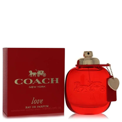 Red Coach Love eau de parfum spray bottle with gold cap and matching box, heart charm attached