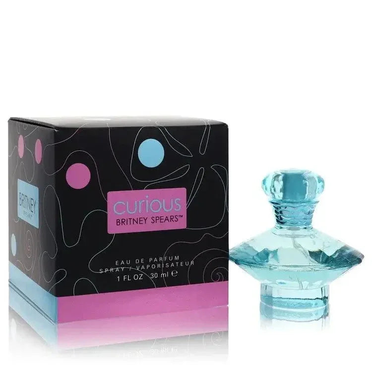 Britney Spears Curious Eau de Parfum bottle in blue diamond glass — floral fresh fragrance with Louisiana magnolia, pear, and tuberose.