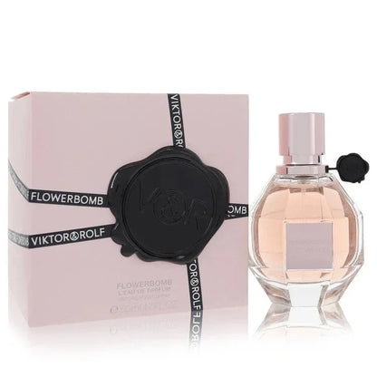 Viktor and Rolf Flowerbomb Perfume signature luxury diamond grenade-shaped flacon displaying its premium rose-gold liquid contours against a clean background