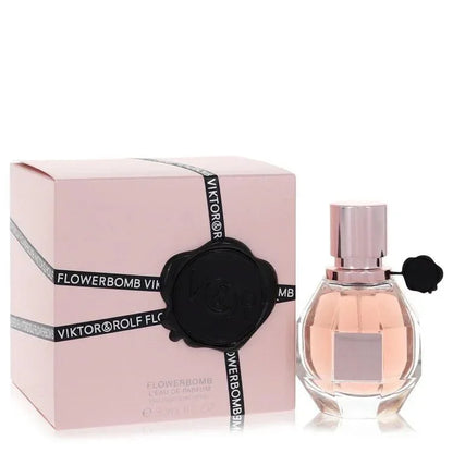 Viktor and Rolf Flowerbomb Perfume signature luxury diamond grenade-shaped flacon displaying its premium rose-gold liquid contours against a clean background