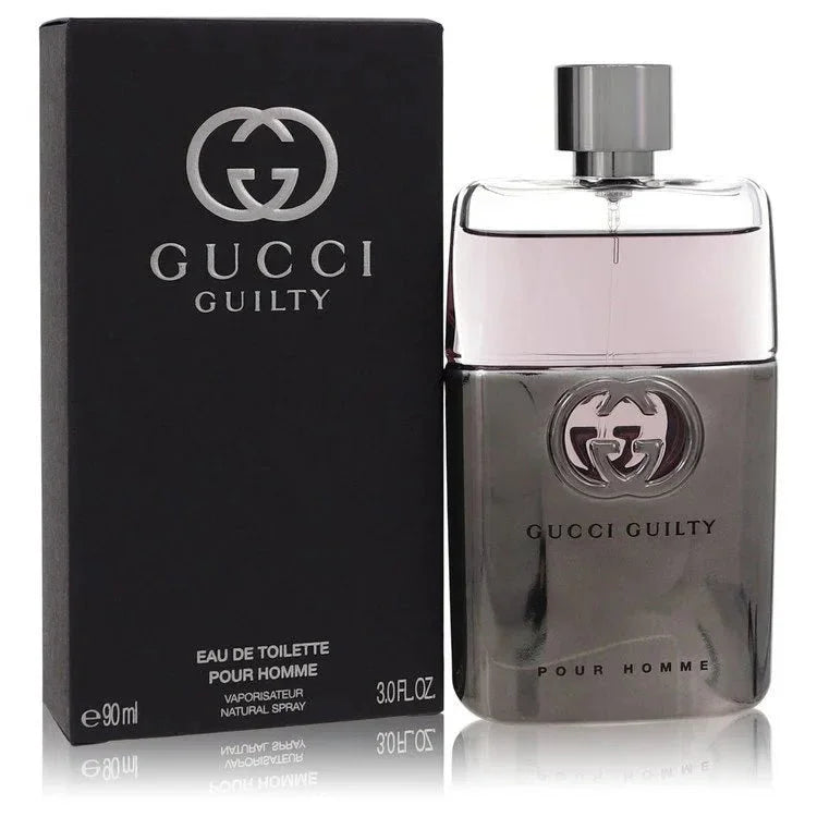 Gucci Guilty Pour Homme Cologne signature luxury charcoal metal-and-glass flacon displaying its iconic interlocking G crest detailing on a clean background