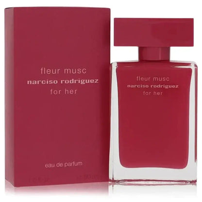 Narciso Rodriguez Fleur Musc Perfume signature luxury opaque pink glass flacon displaying its sleek architectural contours and premium label work against a clean backdrop