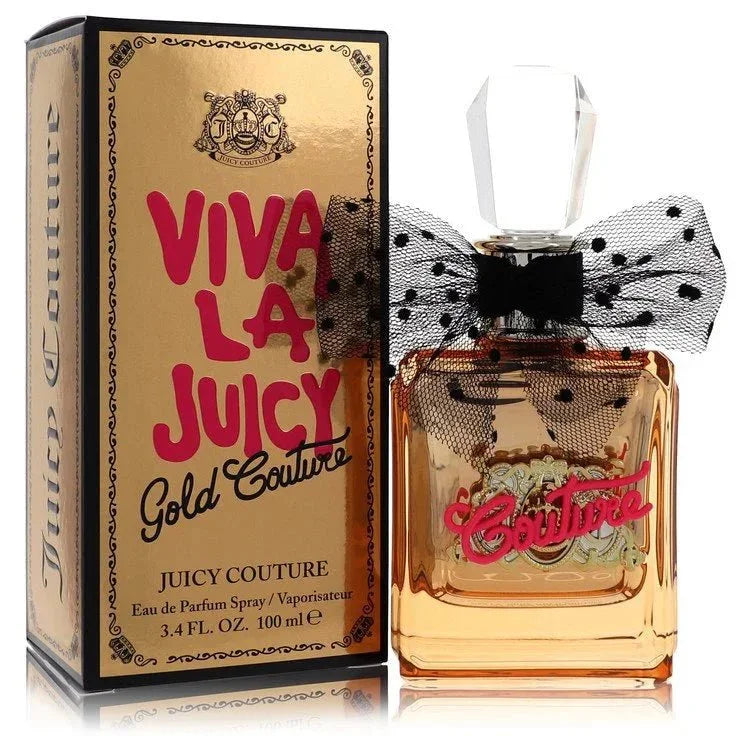 Viva La Juicy Gold Couture Perfume bottle with black polka dot bow — floral fruity gourmand women's fragrance with wild berries, gardenia, vanilla orchid, jasmine sambac, praline, caramel, and vanilla by Honorine Blanc
