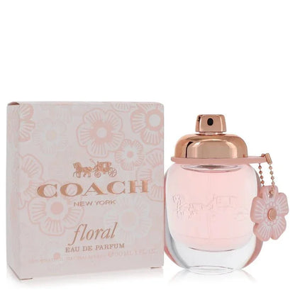 Coach Floral Eau de Parfum spray 1 oz for women with floral box and pink charm.